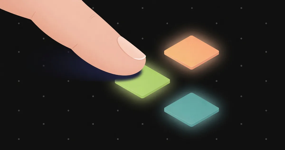 Close-up of a hand coloring one square in a year in pixels grid
